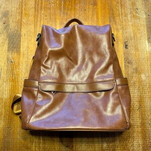 Gorgeous cognac backup that opens from the back for extra security.